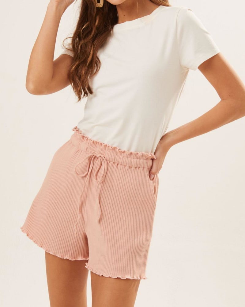 Front of a model wearing a size L Ribbed Drawstring Shorts In Blush in Blush by LUSH. | dia_product_style_image_id:354884
